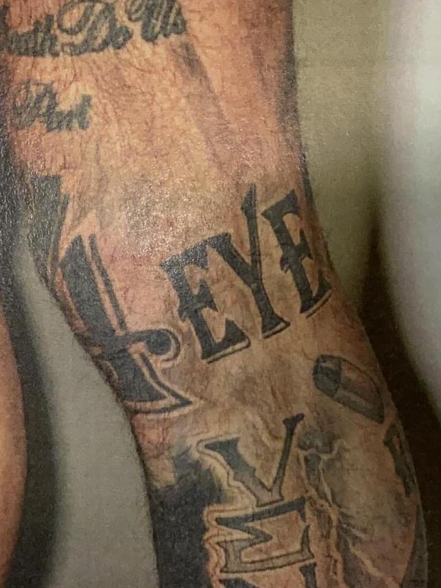 A close up of Abu-Mahmoud’s leg tattoo.