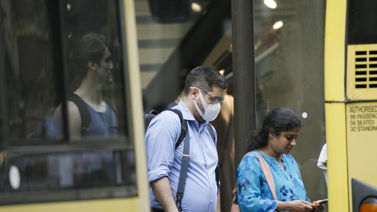 Mask are commonly now being worn around the Sydneys CBD due to the fear of the Coronavirus. Photo: Tim Pascoe