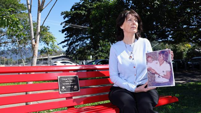 A bright red park bench, which highlights the scourge of domestic violence in society and encourages conversation to end violence, has been installed in a Lake Street park. The site of the bright bench is directly opposite where Cairns woman Gwen Grover was found in a car with a gunshot wound to her head in 1983. Sister of Gwen Grover Sue Cole is humbled to see the new red bench installed on Lake Street in memory of Gwen. Picture: Brendan Radke