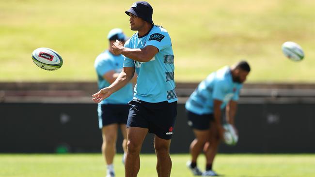 Karmichael Hunt trains with his NSW Waratahs teammates. Picture: Brett Costello