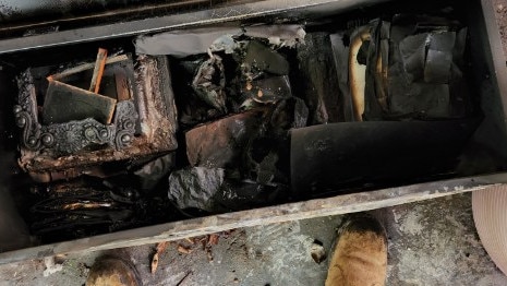 Lismore man Eli Roth looks to see if any possessions can be salvaged from his home which burnt down on Monday. Picture: Supplied