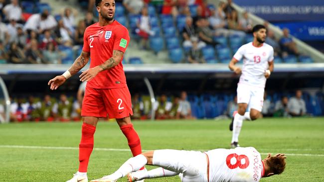 Fakhreddine Ben Youssef of Tunisia goes down in the penalty area after a challenge by Kyle Walker. Picture: Getty