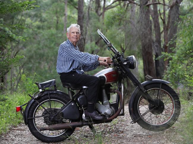 Bruce Reid with his 1948 BSA YV33 motorbike he bought new. (AAP Image/David Swift)