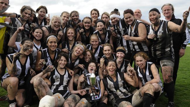 Lisa Walshe and Scoresby celebrate a grand final win.