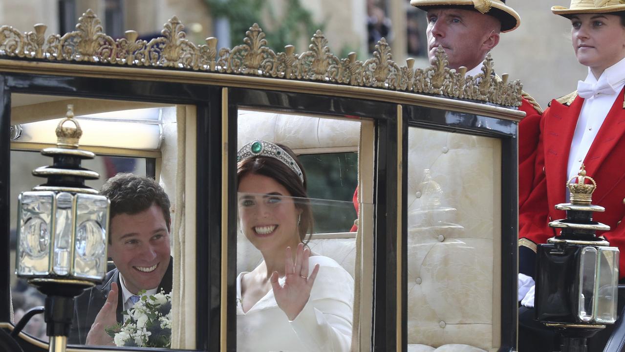 No ‘JUST MARRIED’ sign on the back? Where is the attention to detail? Picture: AP