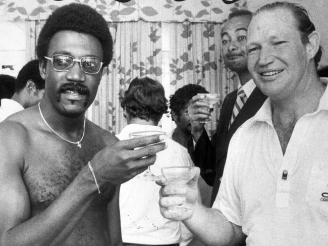 Media executive Kerry Packer (r) with West Indian cricketer Clive Lloyd drinking champagne at party for World Series Cricket 05 Feb 1978. (Pic: Ken Matts)