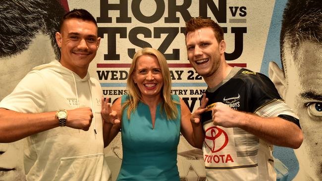 Boxers Tim Tszyu and Jeff Horn, with Tourism Minister Kate Jones, at Queensland Country Bank Stadium for announcement of 'Rumble on the Reef'. Picture: Evan Morgan