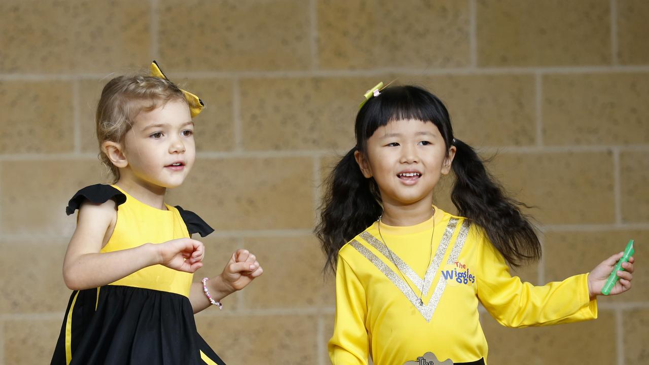 Kitty Berry 4 and Annie Chung 4 at the Wiggles concert at the Cairns Convention Centre. PICTURE: ANNA ROGERS