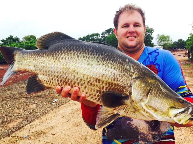 P<s1>eter Cooper with another swamp dog barra that made the journey from the fresh to the brackish salt and hopefully regained its strength.</s1>