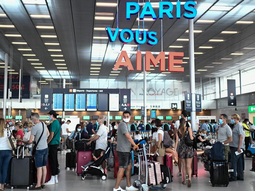 Travellers at Orly Airport, south of Paris. Picture: Stephane De Sakutin/AFP