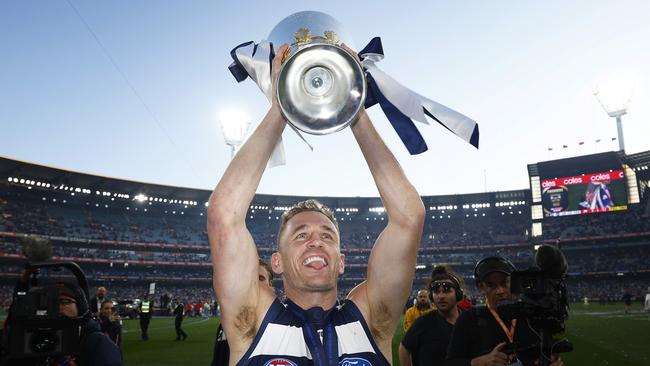 MELBOURNE, AUSTRALIA - SEPTEMBER 24: Joel Selwood of the Cats holds aloft the premiership cup after winning the 2022 AFL Grand Final match between the Geelong Cats and the Sydney Swans at the Melbourne Cricket Ground on September 24, 2022 in Melbourne, Australia. (Photo by Daniel Pockett/AFL Photos/via Getty Images)