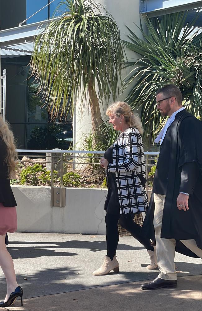 Emilia Lloyd (centre) leaves Southport Magistrates Court with her legal team.