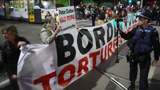 Protesters in Melbourne attack the government’s asylum-seeker policy. Picture: AAP