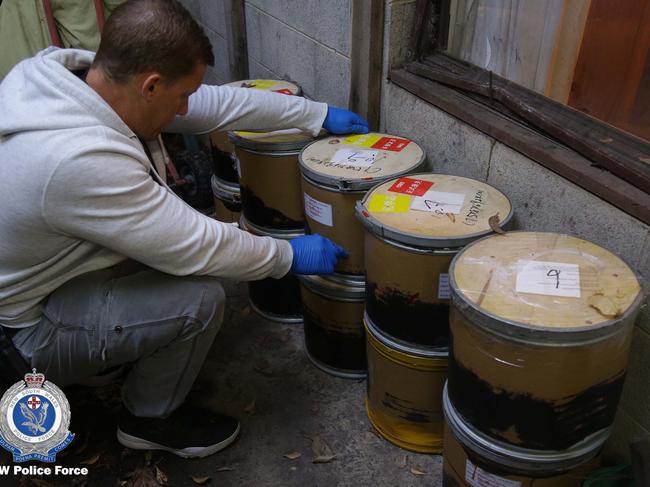 Drums of precursor chemicals have been seized.