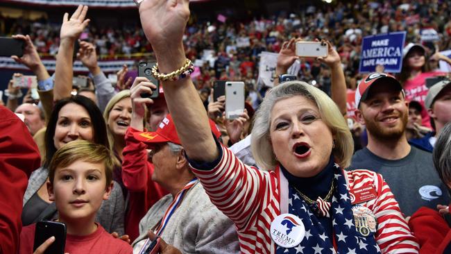 Supporters cheer for Donald Trump at a rally in Chattanooga, Tennessee yesterday. Picture: AFP