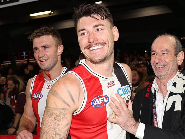 MELBOURNE, AUSTRALIA - JULY 07: Andrew Bassat, President of St Kilda Football Club celebrates with Josh Battle of the Saints during the round 17 AFL match between St Kilda Saints and Sydney Swans at Marvel Stadium, on July 07, 2024, in Melbourne, Australia. (Photo by Kelly Defina/Getty Images)