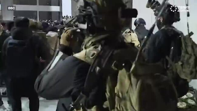 Brave moment woman grabs soldier’s gun in South Korea