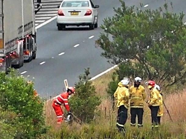 The scene of the crash on the Pacific Motorway about 15 minutes south of Coffs Harbour. Picture: Frank Redward