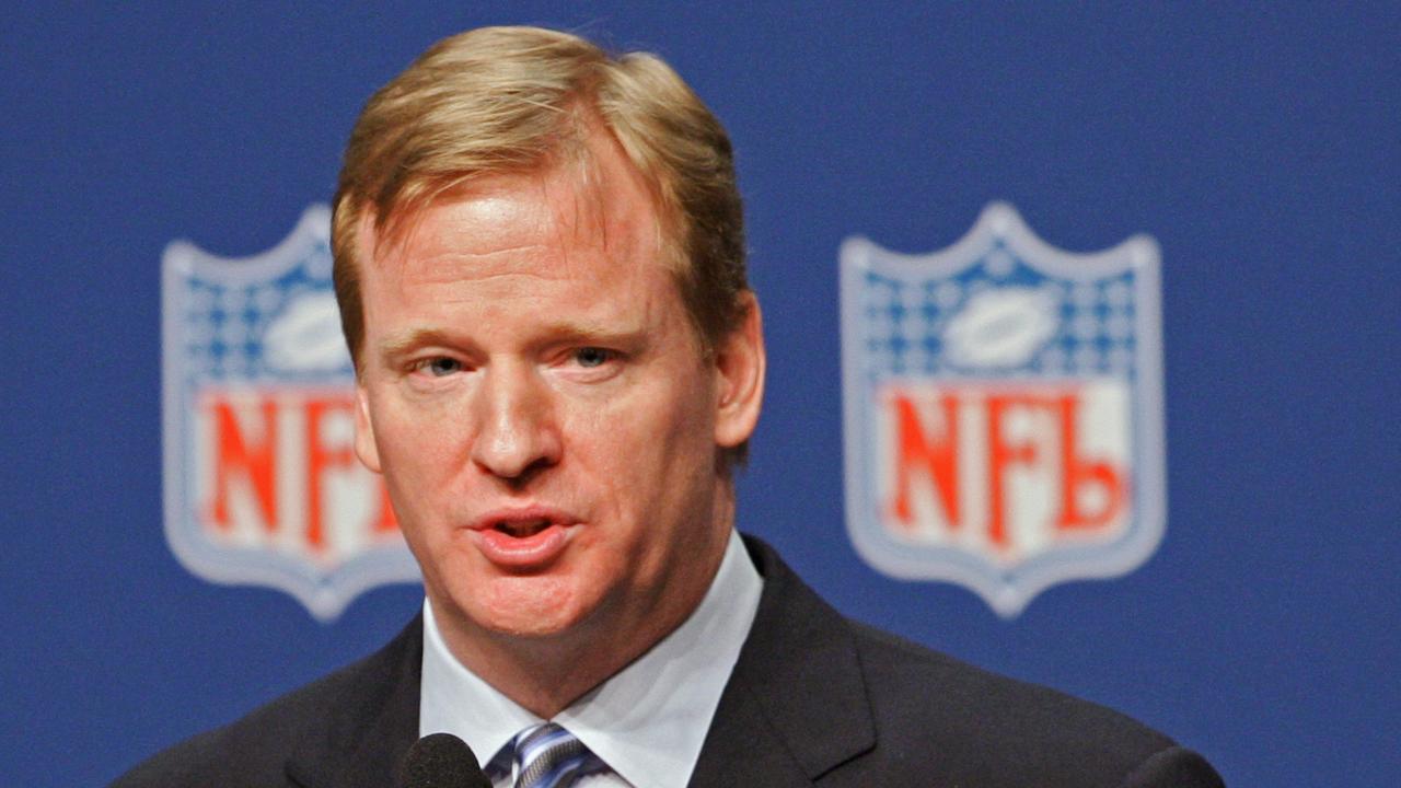 (FILES) In this February 1, 2008 file photo, NFL Commissioner Roger Goodell addresses the media at the news conference prior to Super Bowl XLII at the Phoenix Convention Center in Phoenix, Arizona. Goodell faced US lawmaker questions and a call to resign by a women's advocacy leader September 10, 2014 over his handling of the Ray Rice domestic violence incident. Video of NFL star running back Rice knocking out his then-fiancee and now-wife Janay last February in a casino elevator went public Monday, prompting the Baltimore Ravens to fire him and Goodell to suspend Rice indefinitely for an incident that he had previously punished with only a two-game ban. While Goodell admitted last month the penalty was too soft and toughened domestic violence bans, the brutal video has put the boss of the world's richest sports league on the hot seat. Drew Hallowell/Getty Images/AFP =FOR NEWSPAPERS,INTERNET,TELCOS AND TELEVISION USE ONLY= == FOR NEWSPAPERS, INTERNET, TELCOS & TELEVISION USE ONLY ==