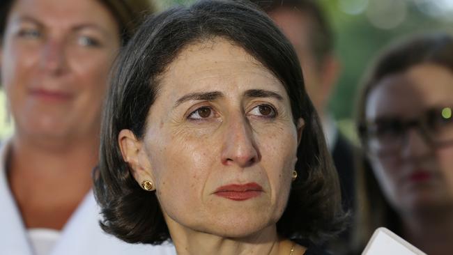 NSW Premier Gladys Berejiklian is expected to halt mergers which are before the courts.