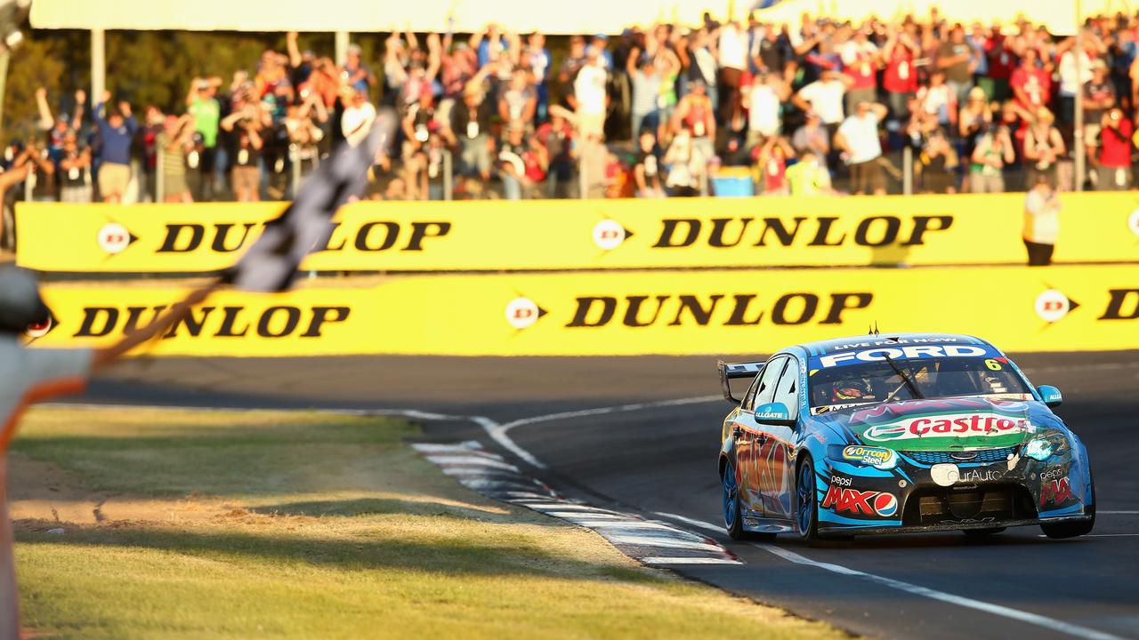 The greatest race of all? Chaz Mostert takes the flag at Bathurst in 2014.