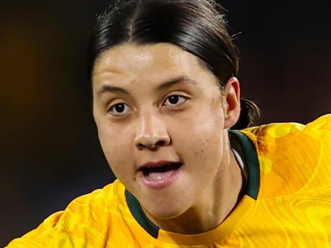 SYDNEY, AUSTRALIA - AUGUST 16: Sam Kerr of Australia celebrates after scoring her team's first goal  during the FIFA Women's World Cup Australia & New Zealand 2023 Semi Final match between Australia and England at Stadium Australia on August 16, 2023 in Sydney, Australia. (Photo by Brendon Thorne/Getty Images)