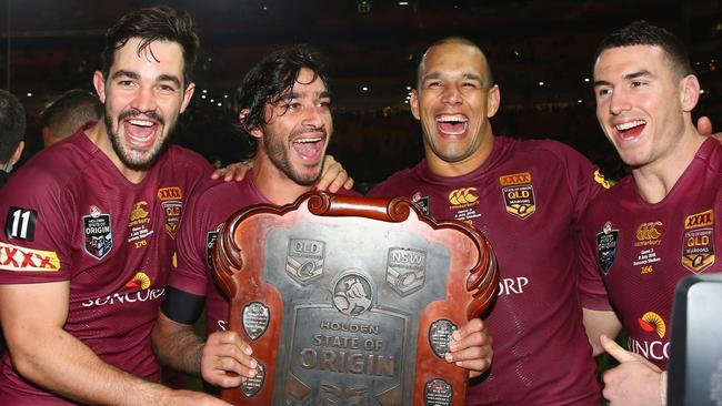 BRISBANE, AUSTRALIA - JULY 08:  Aidan Guerra, Johnathan Thurston, Will Chambers and Darius Boyd of the Maroons celebrate victory during game three of the State of Origin series between the Queensland Maroons and the New South Wales Blues at Suncorp Stadium on July 8, 2015 in Brisbane, Australia.  (Photo by Mark Kolbe/Getty Images)