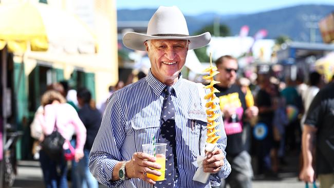 Kennedy MP Bob Katter enjoys the culinary delights of the Cairns Show on the final day of the Cairns Show. Picture: Brendan Radke