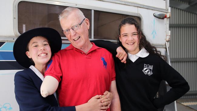 Pride of Australia. L-R:  Ayumi, Colin Bailey, girlfriend Aja. 65 year old Colin Bailey is lucky to be alive. After a horrific accident on his remote property outside of Jindabyne NSW, where his right arm was amputated above the elbow, his young 12 year old daughter Ayumi Bailey and her girlfriend Aja Bailey, also 12 at the time,  saved his life by applying emergency first aid. Aja applied a tourniquet while Ayumi called 000 for help.Picture Gary Ramage