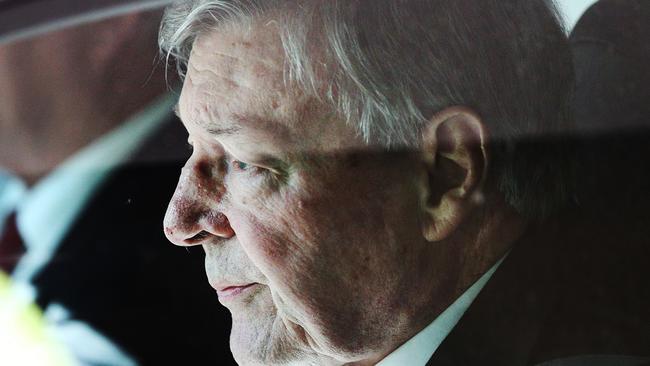 Cardinal George Pell leaves at Melbourne Magistrates' Court. Picture: Getty Images.