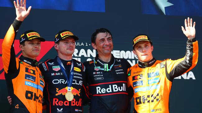 Verstappen, second from left, flanked by, from left, second-placed Norris, Enrico Balbo, head of aerodynamics at Oracle Red Bull Racing, and third-placed Piastri. Picture: Clive Rose/Getty Images