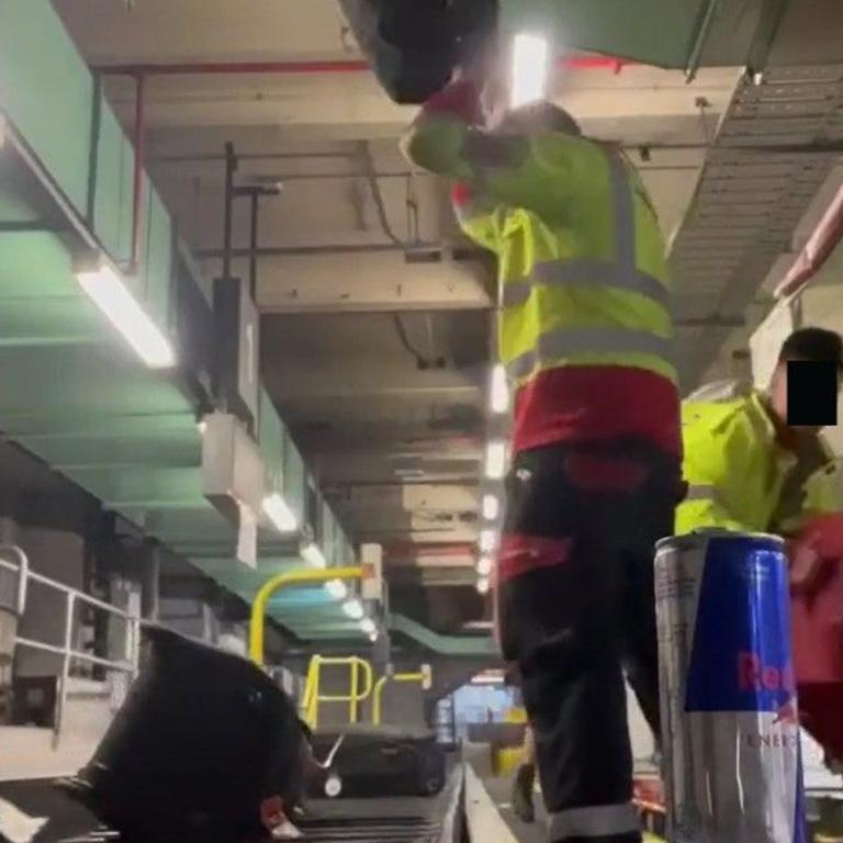 Qantas has launched an “urgent” probe into shocking footage of its baggage handlers throwing, kicking and slamming luggage.