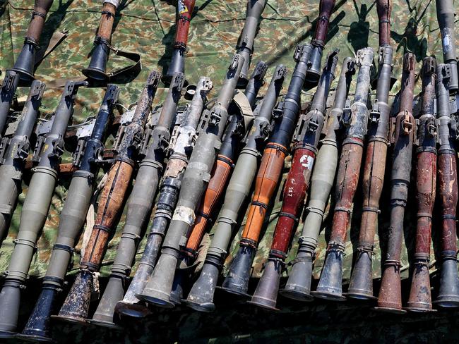 Weapons which the Israeli army says belonged to the Lebanese militant group Hezbollah, and is part of weaponry seized by the army during its ground operation in south Lebanon. Picture: AFP