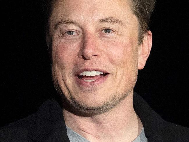 (FILES) In this file photo taken on February 10, 2022 Elon Musk gestures as he speaks during a press conference at SpaceX's Starbase facility near Boca Chica Village in South Texas. - Elon Musk tweeted on August 16, 2022 that 