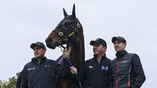 Trainer Chris Waller, strapper Umut Odemislioglu and jockey Hugh Bowman pose with champion Winx