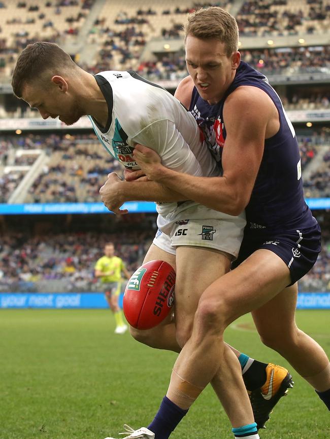 Ryan Nyhuis tackles Robbie Gray. Pic: Getty Images