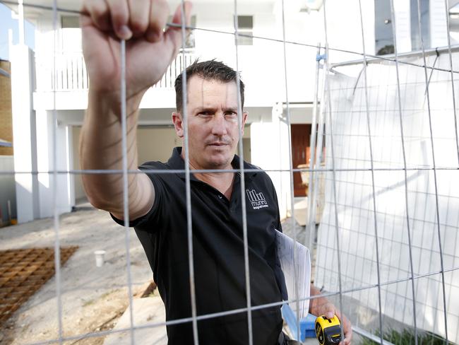 Chris Munro from Munro Designed Homes pictured on site in Coorparoo, Brisbane 2nd of March 2022.  (Image/Josh Woning)