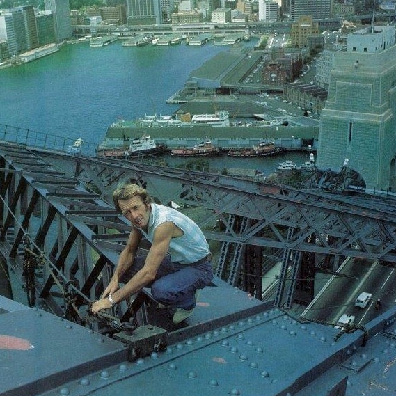 Paul Hogan on top of Sydney Harbour Bridge.