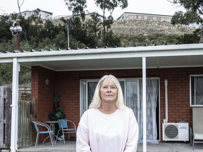 Karen Oliver lives in constant fear of a landslide wiping out her and her Abbotsfield Road unit in Claremont. Picture Eddie Safarik