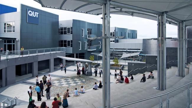 Students mingle in a courtyard at the Queensland University of Technology.