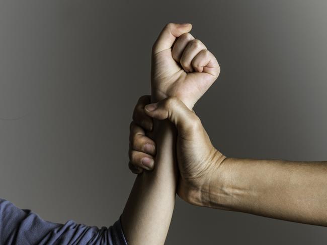 istock generic:  woman, abuse, DV, domestic violence, harassment, sexual harassment.   Parent is holding her little girls arm and is about to use violence. Representing child abuse and domestic violence. . Picture: istock