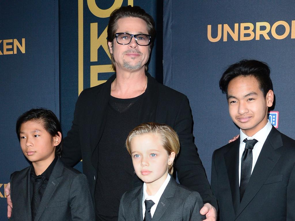 Brad with Pax, Shiloh and Maddox the premiere of Unbroken in 2014. Picture: AFP PHOTO / ROBYN BECK