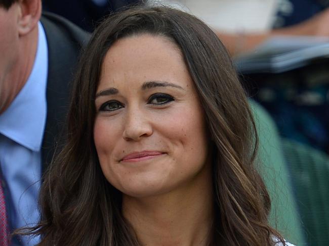 (FILES) This file photo taken on June 28, 2012 shows Pippa Middleton, sister of Britain's Catherine Duchess of Cambridge, sitTING in the Royal Box on Centre Court on day four of the 2012 Wimbledon Championships tennis tournament at the All England Tennis Club in Wimbledon, southwest London. Pippa Middleton hit the headlines with a figure-hugging outfit at her sister Kate's wedding to Prince William, but now the world-famous bridesmaid is becoming a bride herself as the 33-year-old marries financier James Matthews on May 20, 2017. / AFP PHOTO / Miguel MEDINA