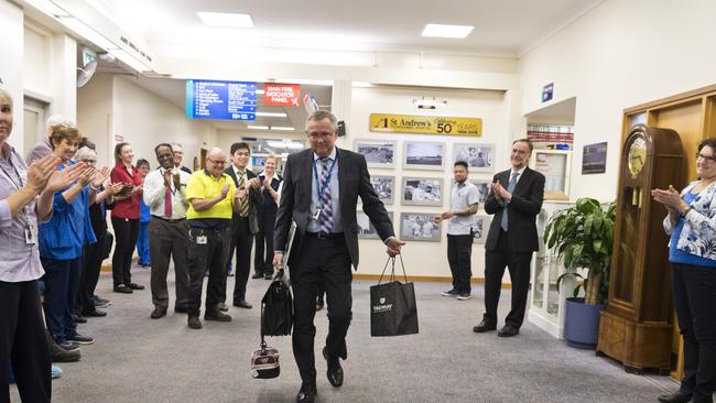 SERVICE RECOGNISED: Staff of St Andrew’s Toowoomba Hospital clap in recognition of the 20 years of service by CEO Ray Fairweather as he retired from the role on Friday afternoon. Picture: Kevin Farmer