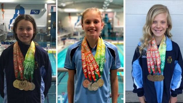 (L-R) Warringah Aquatic Centre swimmers Milla Lawrence, Zara Kasprowicz and Jaslyn Plummer claimed 18 medals at the School Sport Australia National Swimming Championships.