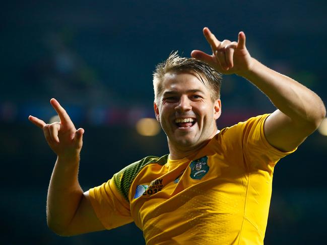 LONDON, ENGLAND - OCTOBER 10:  Drew Mitchell of Australia celebrates victory after the 2015 Rugby World Cup Pool A match between Australia and Wales at Twickenham Stadium on October 10, 2015 in London, United Kingdom.  (Photo by Mike Hewitt/Getty Images)