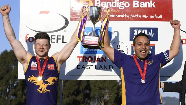 Vermont captain Lachlan Johns and coach Harmit Singh hold the 2018 top-flight cup aloft. Picture: Andy Brownbill.