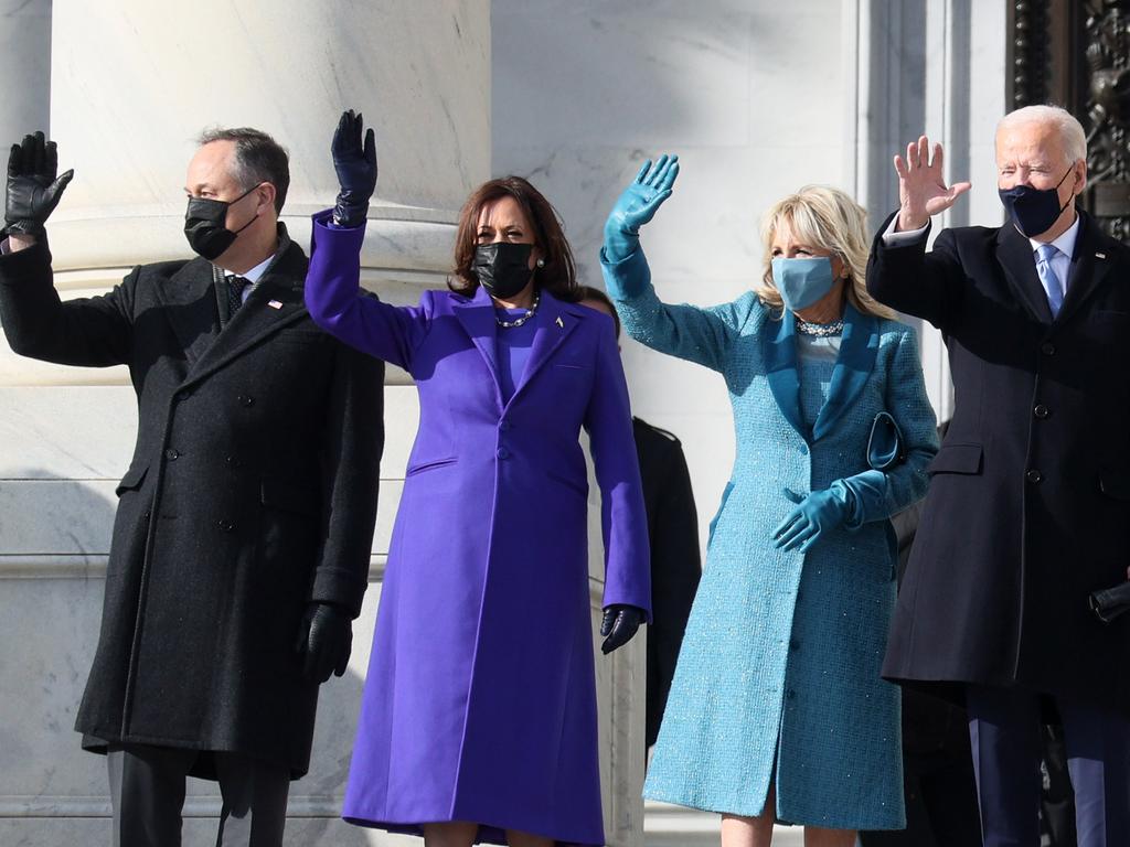 (L-R) Doug Emhoff, U.S. Vice President-elect Kamala Harris, Jill Biden and President-elect Joe Biden wave as they arrive on the East Front of the US Capitol. Picture: Getty Images