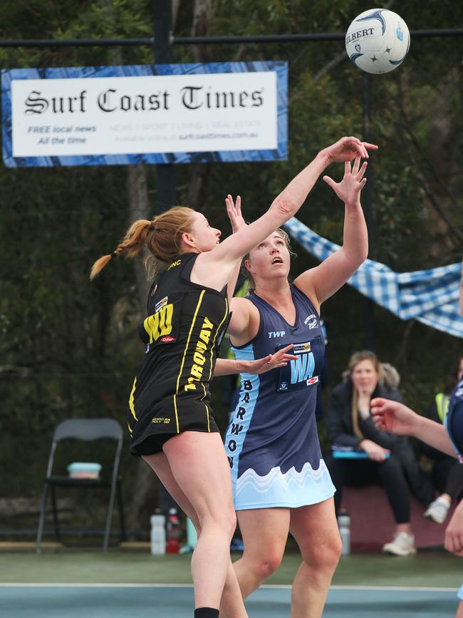 Midcourter Erica Schippers (right, pictured playing for Barwon Heads against Torquay) has signed at the Tigers. Picture: Alan Barber