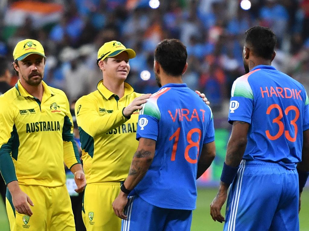 Steve Smith and Indian rival Virat Kohli share a moment after their Champions League semi final. Picture: Picture: AFP